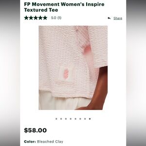 A pale pink colored top from Free People. Newly bought and never worn